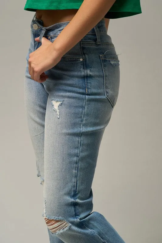 MID-RISE SLIM TAPERED JEANS